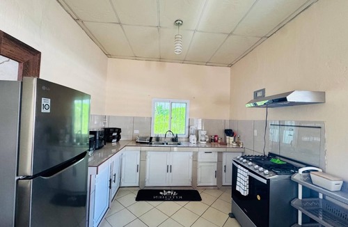 Izabal House | Cozy 2-bedroom house in welcoming Puerto Barrios with AC