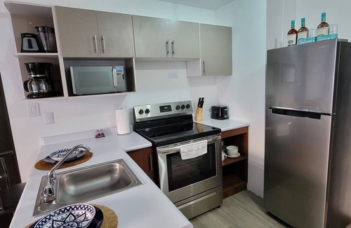 Zona 12 Apartment | Cozy apartment, your family will be close to everything. City & volcanoes views.