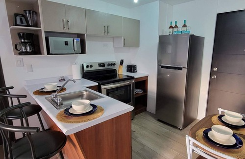 Zona 12 Apartment | Cozy apartment, your family will be close to everything. City & volcanoes views.