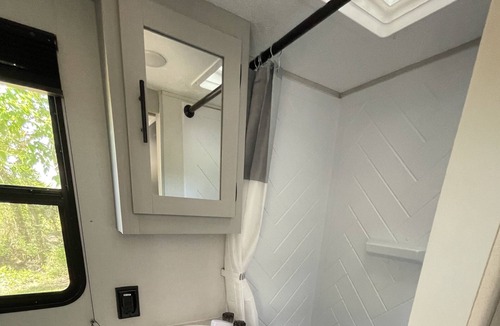 Abercrombie House | Cozy camper with full hookups, free parking, and free Wifi!