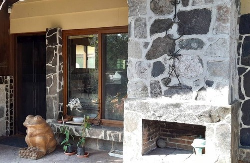 Panajachel Cottage | Cozy country cottage with wooden ceilings and stone walls within nature reserve.