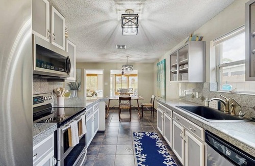Laguna Vista House | Cozy home on golf course with TV, hot tub spa & minutes to beach