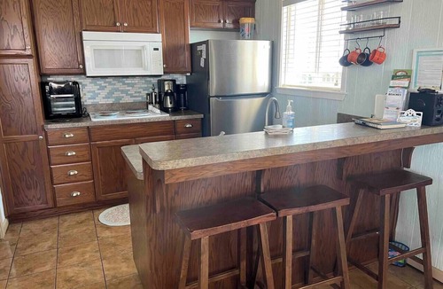 Holly Beach House | Cozy studio walking distance to the beach, Seas the Day Beach House