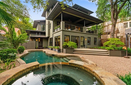 Bouldin House | Downtown, sleeps 24, 2 pools, spas, game room, gym