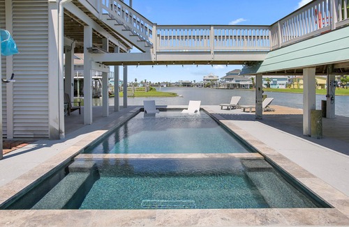 Jamaica Beach House | Dreams Float! - Expansive Decks, Pool, Elev, 2 Masters - Canal w Epic Views