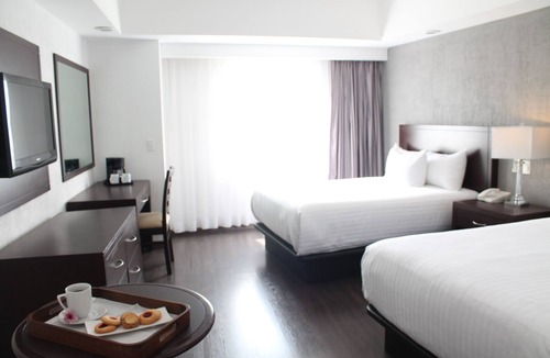 Financial District Hotel | Ejecutivo Express Consulado