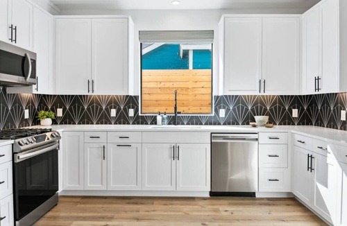 East MLK House | Expansive Luxury Duplex | Shared Pool