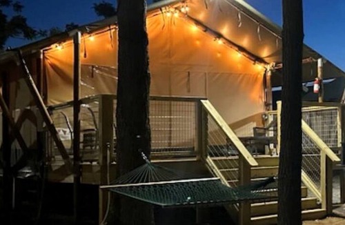 Prairie Lea RV Rental | Fully-Equipped Riverside Glamping Safari Tent on the San Marcos River, Texas