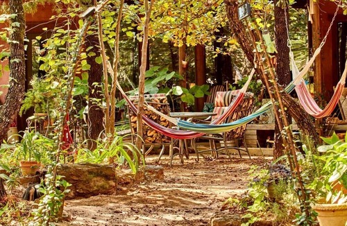 Van Zandt County Cabin | Gorgeous Multi-Unit Cabin Rental for Larger Groups Nestled in the Trees for an Unforgettable Getaway in Nature in Ben Wheeler, Texas