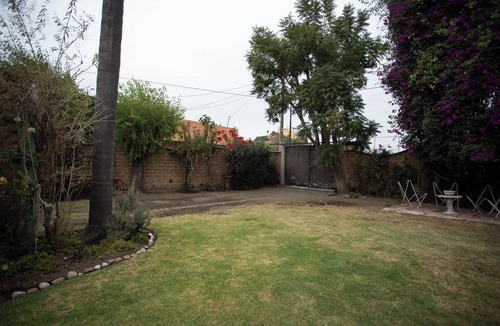 Cholula House | House with garden in front of the Pyramid of Cholula, Puebla,MX