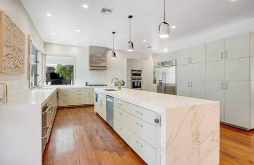 Hunt House | Inviting waterfront home with pool, patio, fireplace, W/D, & dog-friendly