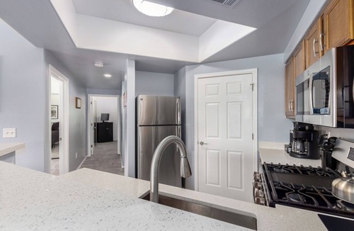 Maryvale Condo | KING Beds, Heated Community Pool! 3 miles from Cardinal Stadium!