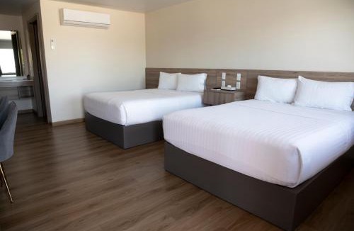 Cuauhtemoc Hotel | La Huerta Inn & Suites