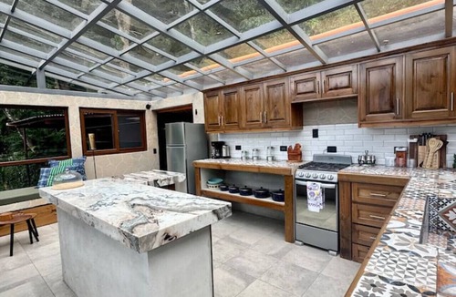 San Lucas Toliman Bed & Breakfast | Lake Front Apartment with Jacuzzi, Pool, & Sauna