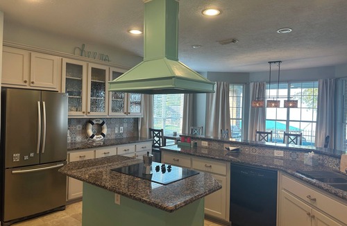 West Livingston House | Lakefront Getaway on Lake Livingston, Sleeps 18, Dock, Slide & Sunset Views