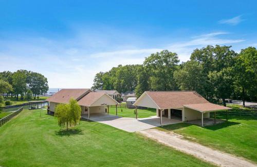 West Livingston House | Lakefront home with huge yard and picturesque front Porch