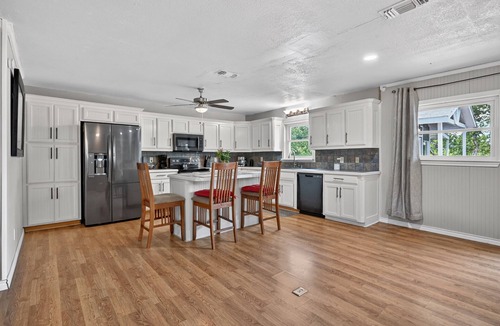 Azle House | Lakefront with Treehouse, Pool, Gameroom and hottub. 5BR, 4bath