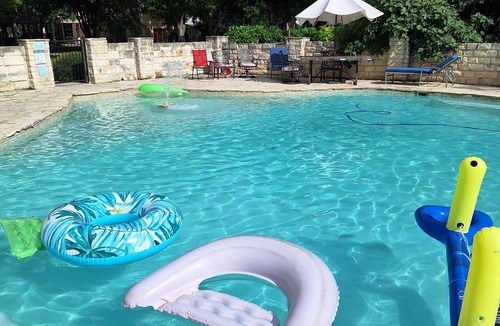 Seguin House | Large Mediterranean pool, river, basketball, sleeps 26, 8 bedrooms