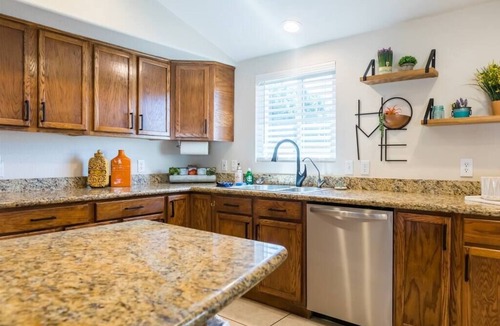Avondale House | Large oasis, pool heater, spa, putting green