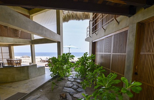 Santa Maria Tonameca Villa | Las Palmas: fine designed room in a spectacular front beach setting.