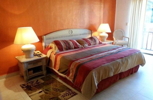 South Hotel Zone Hotel | Los Tules Vibrant 1BR Condo with Balcony for Vacation Spots