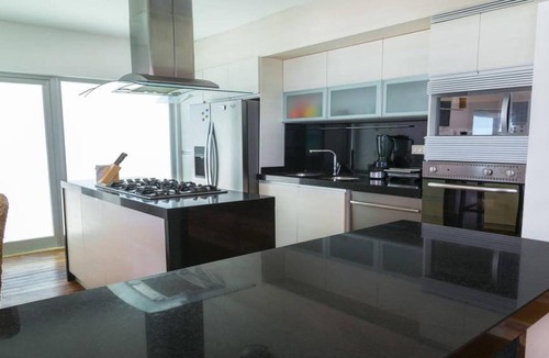 Playacar Fase I House | Luxury Beachfront Villa with a Pool & Deck in guard-gated Playacar