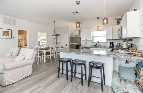 Surfside Beach Condo | Luxury Beachfront Condo with Covered Deck Steps From Beach & Golf Cart Rental
