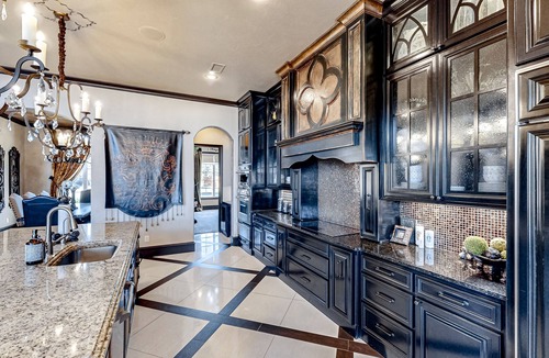 Lubbock House | Luxury home with private pool, waterslide, grill, home theater, & office