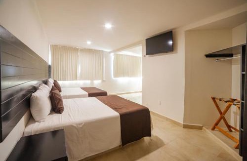 Crucecita Hotel | Mayev Express