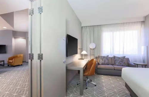 Richardson Hotel | Modern and Stylish Room Close to Eisemann Center – 1.1 Miles