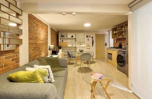 Del Carmen Apartment | Modern brick retreat in Coyoacán | Patio
