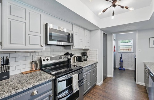Northeast Carrollton House | Modern & Chic 4-BD/2-BA | Pool, Hot Tub, BBQ Grill