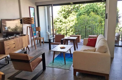 Colonia 5 de Diciembre Apartment | Modern city living in the heart of Old Town PV! Walking distance to everything.