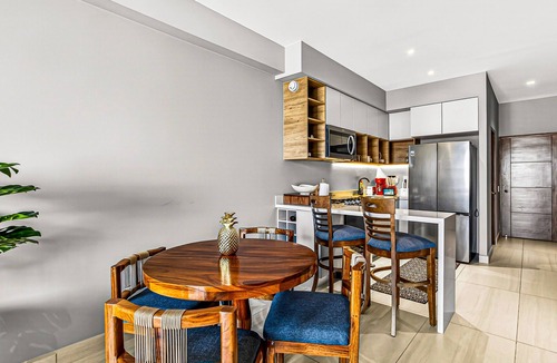 Fluvial Vallarta Condo | Modern condo with rooftop pool, balcony, gas grill & gym access