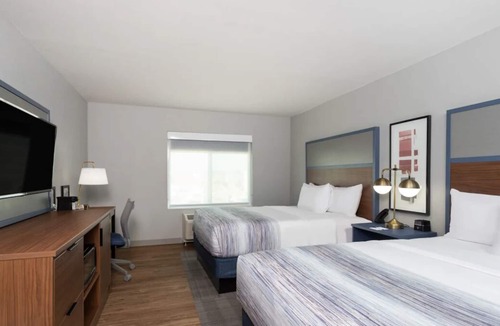San Angelo House | Modern Convenience! 2 Relaxing Units! Onsite Pool, FREE Breakfast, Parking!