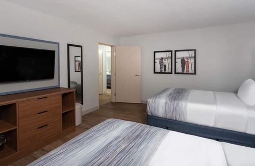 San Angelo House | Modern Convenience! 2 Relaxing Units! Onsite Pool, FREE Breakfast, Parking!