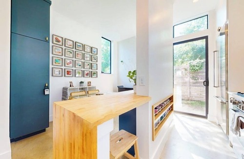 St. Edwards House | Modern two story home with kitchen, gated yard, balcony, close to South Congress