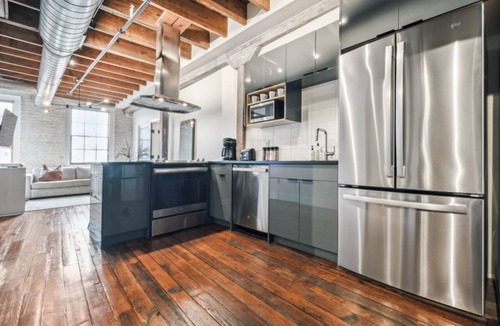 Central Business District Hotel | NOLA Chic: Explore Bourbon Street from Your 4BR Condo