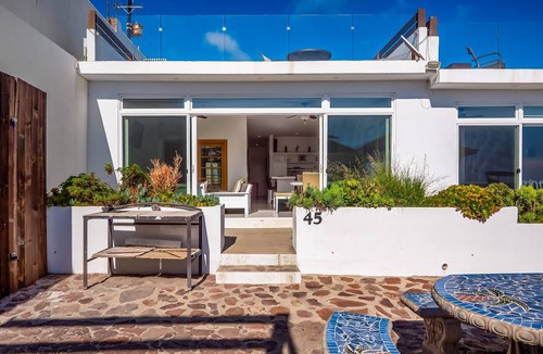 La Paloma Villa | Peaceful dog-friendly villa with outdoor pool, rooftop patio, beach views, & AC