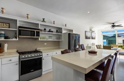 La Paloma House | Peaceful Dog-Friendly Villa with Outdoor Pool, Rooftop Patio, Beach Views, & AC