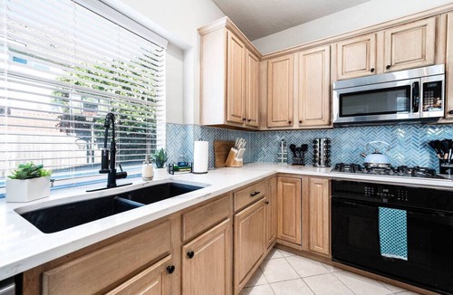 Pearland House | Pearland Poolside Paradise with Fire Pit, BBQ and Games