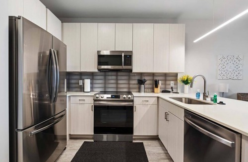 Madison Apartment | Poolside Apt with Garage & In-Unit Laundry