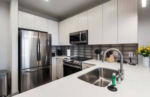 Madison Apartment | Poolside Apt with Garage & In-Unit Laundry