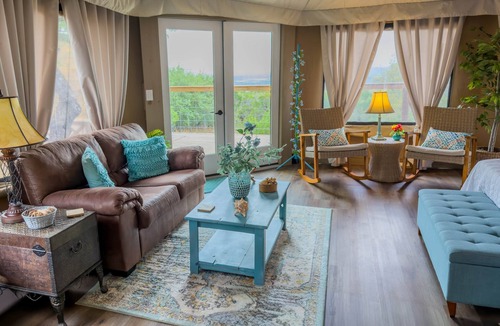 Oatmeal RV Rental | Premium Suite 1 - Safari Tent - Private Deck/Hot Tub