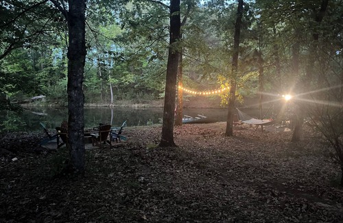 Avinger Cabin | Priv 80 secluded spa cabin retreat in woods nature ATV trails fish hunt relax