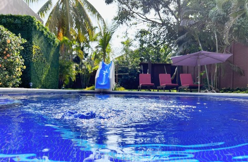 Puerto San Jose Ski Chalet | Private family house, with pool, water slide and swings.