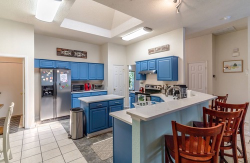 Crowley House | Private Heated Pool, Big Hot Tub, Fenced Yard, Fire Pit, 6 TVs, & Stone Floors