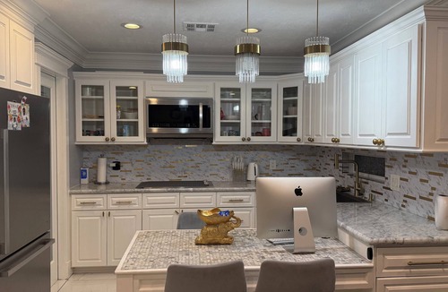 FM 1960 House | Private Luxury Poolside Guest Suite with Fire Pit & Modern Interior