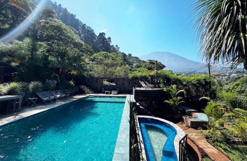 San Lucas Toliman Hotel | Private Room With Jacuzzi, Pool, and Sauna.