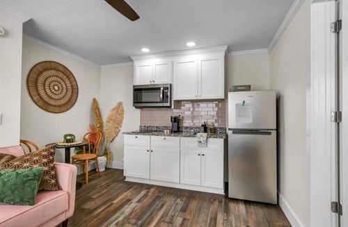 Safety Harbor Hotel | Queen bed, kitchenette, living room/couch.